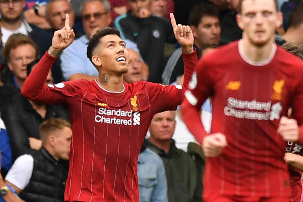 Firmino del Liverpool esulta per il gol al Chelsea