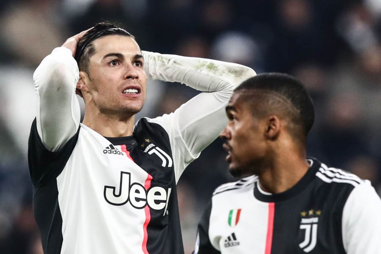 Cristiano Ronaldo e Douglas Costa (Getty Images)